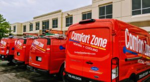 Row of Comfort Zone Service vans parked side by side.
